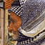 An Iraqi reads a poster with a fatwa, or religious ruling...